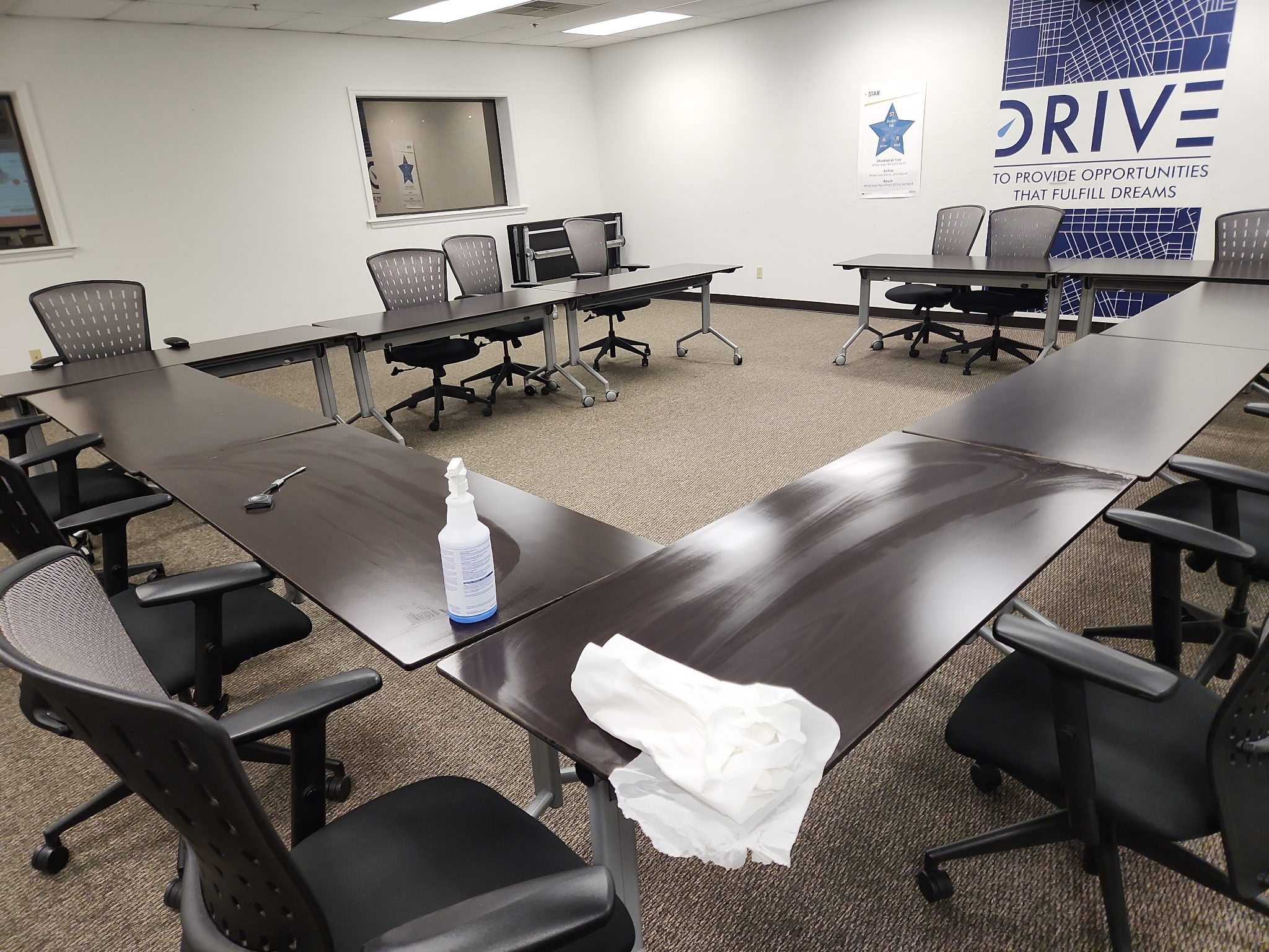 Conference room tables cleaned and set for meetings