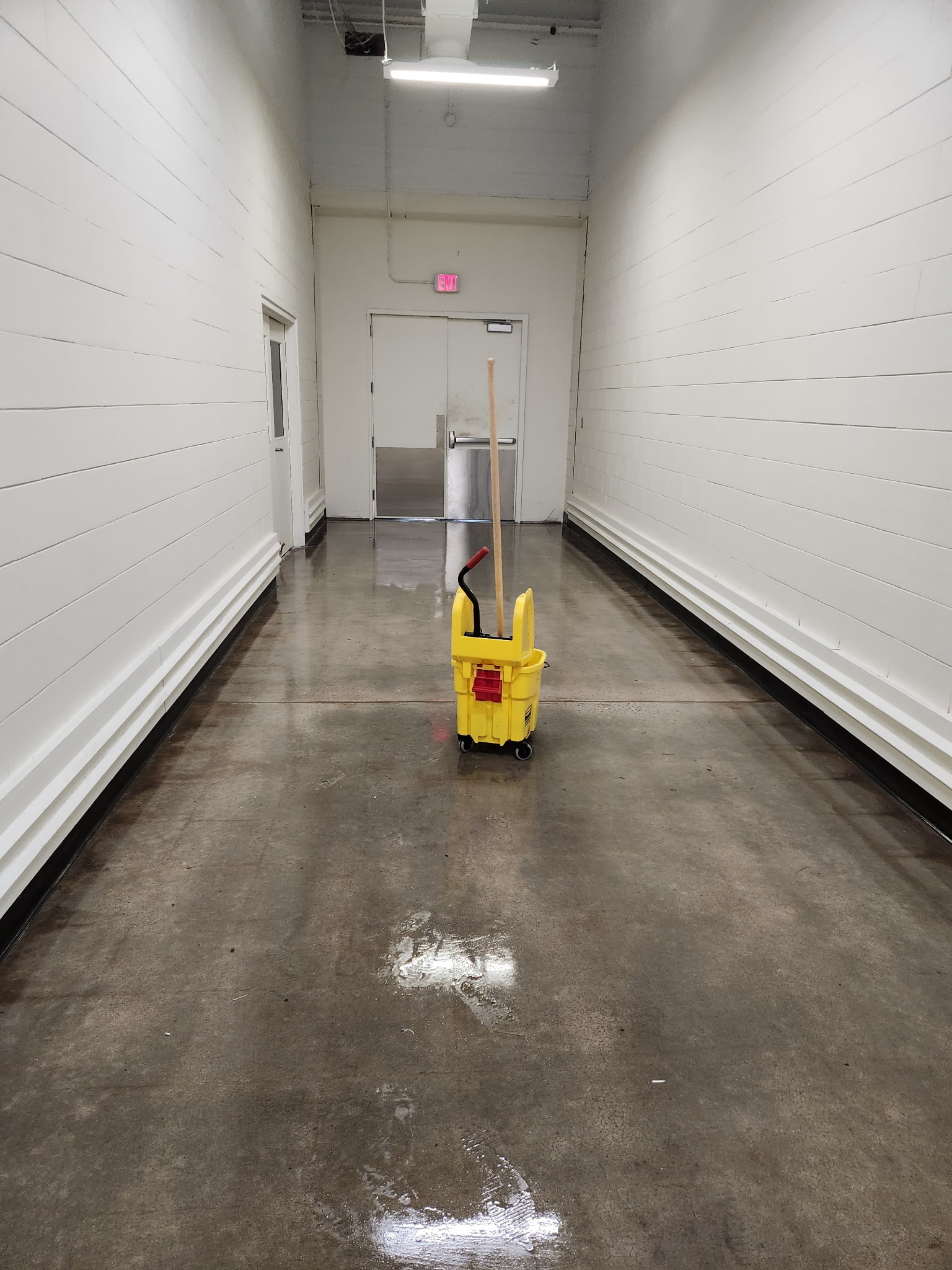 Exit hallway floor freshly cleaned