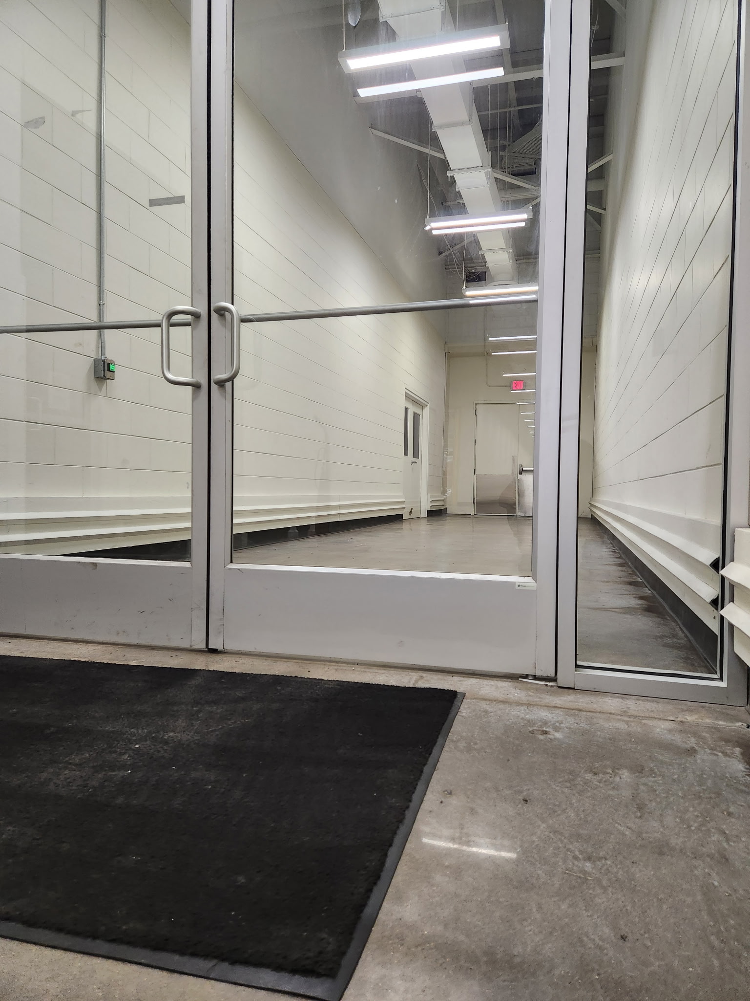 Long exit hallway clean, dry, and polished after service