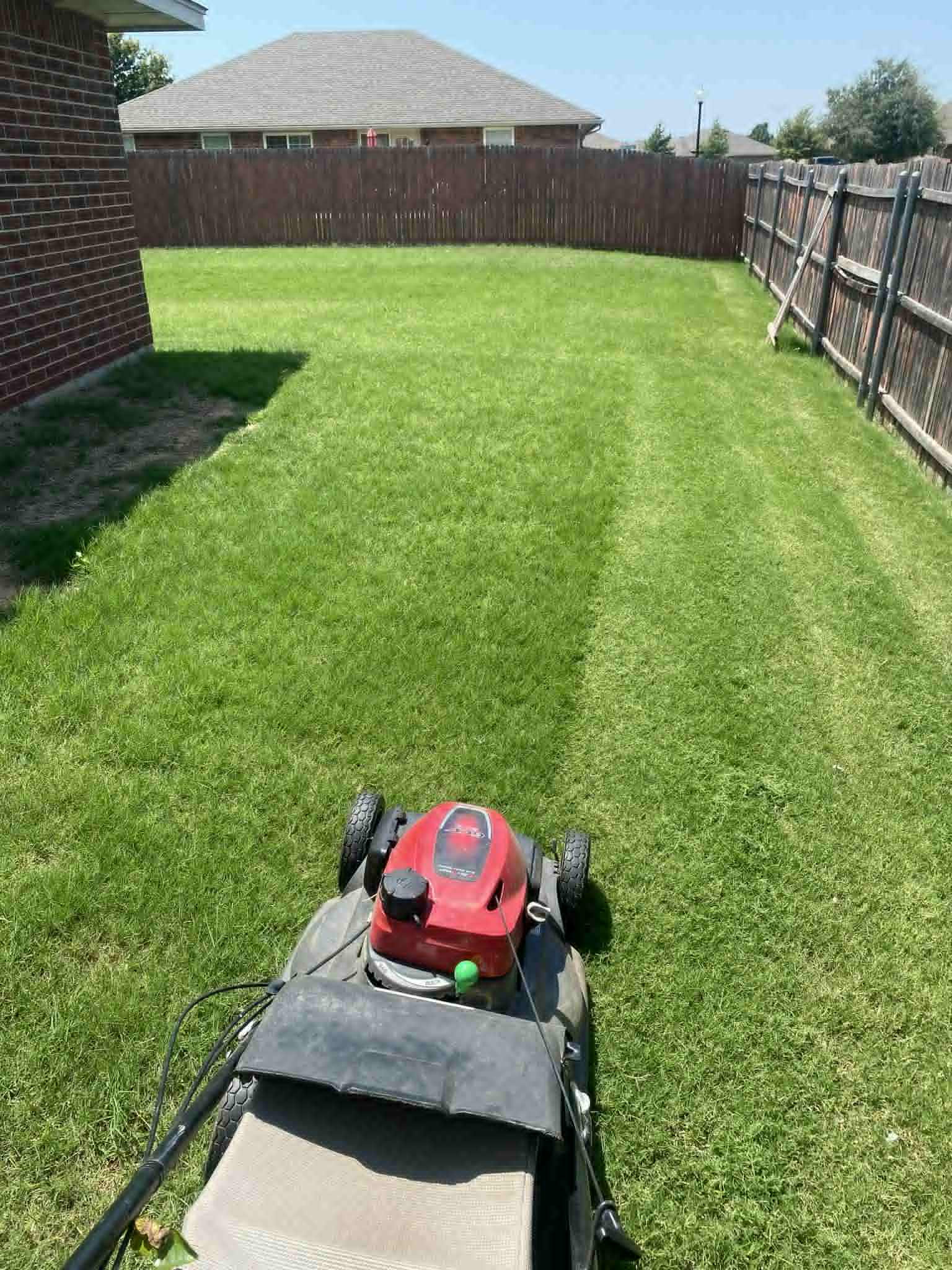Trimmed grass and clean patio edges