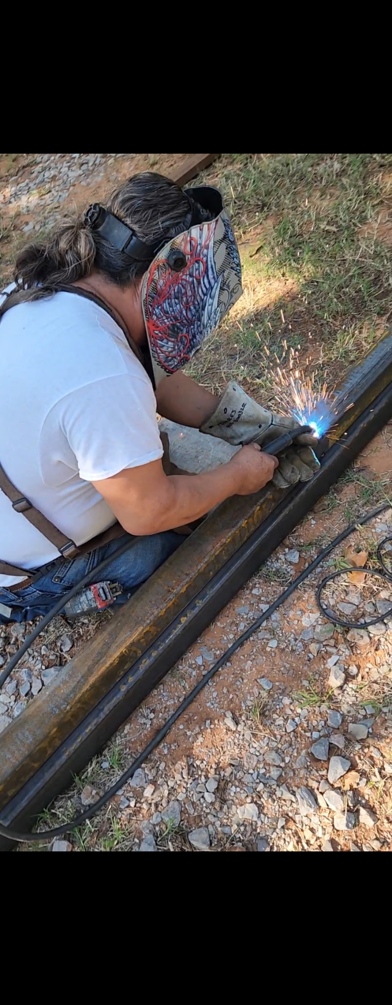 Debris cleanup around welding fence area