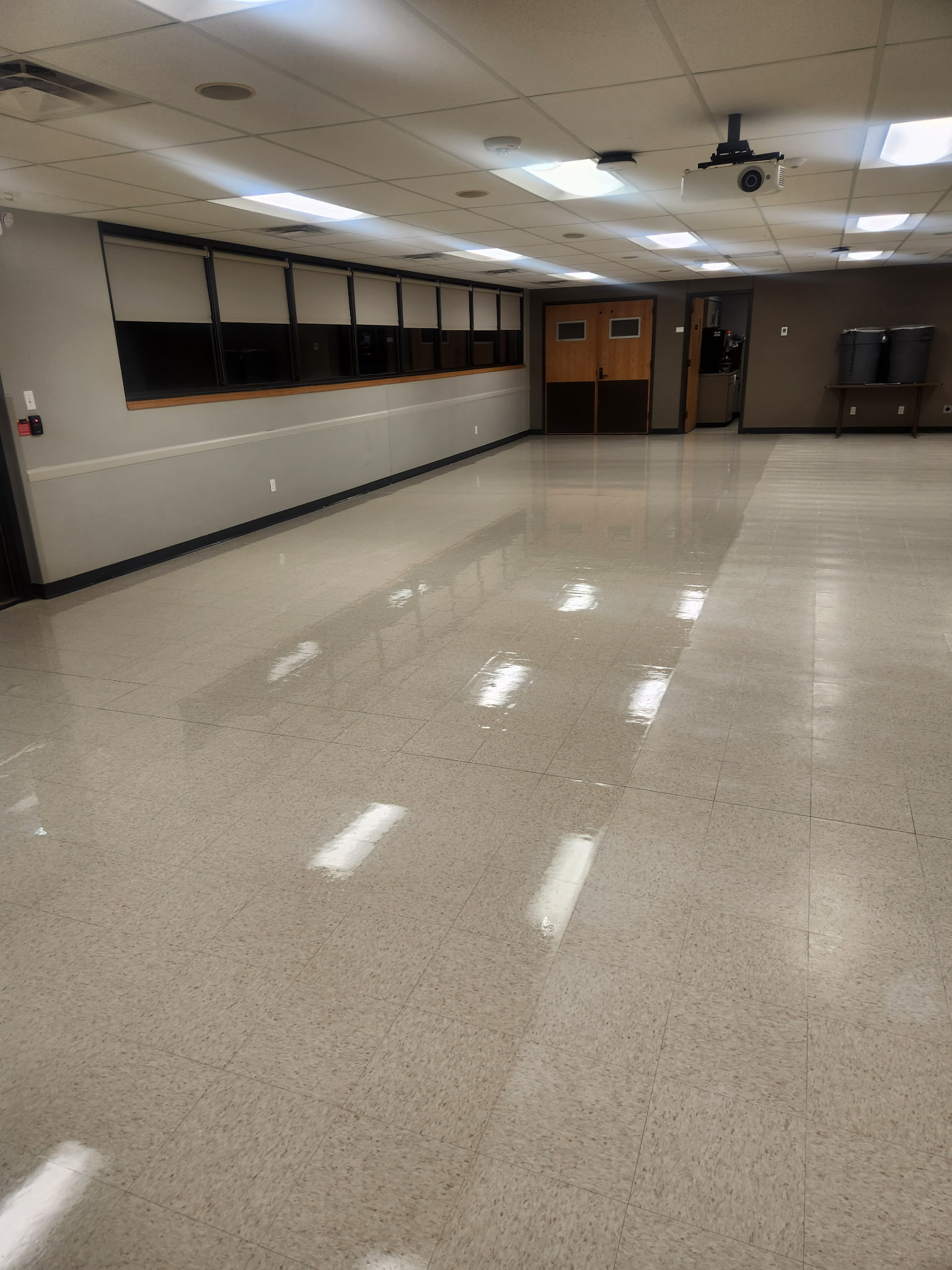 After: freshly stripped and waxed floors shining