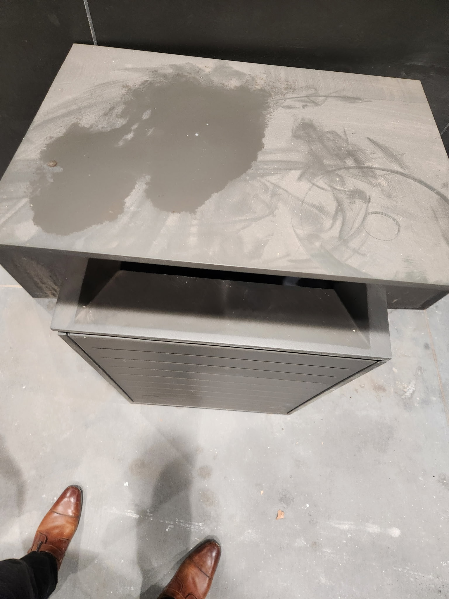 Before: office cabinet dusty with smudges and debris